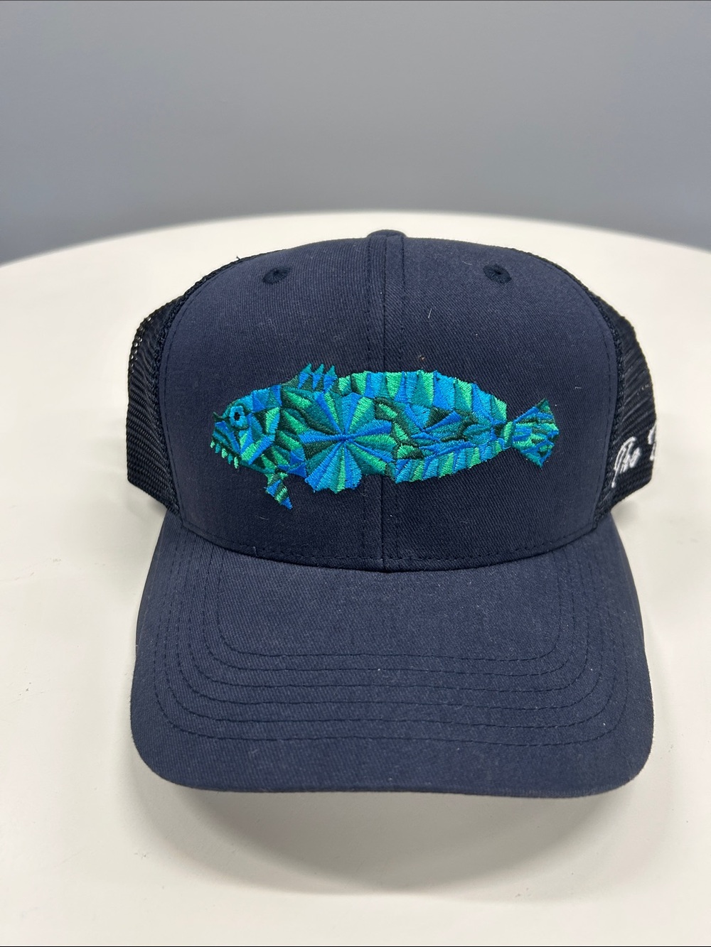 Navy Trucker Cap with Teal & Turquoise Embroidered Fish - Toadfish